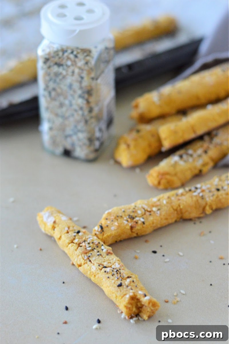 Individual Low Carb Everything Bagel Breadsticks With Pumpkin on a baking sheet