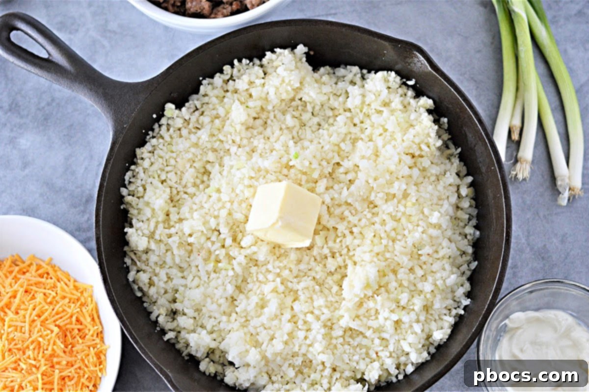 Cooking Cauliflower Rice with Butter in a Skillet