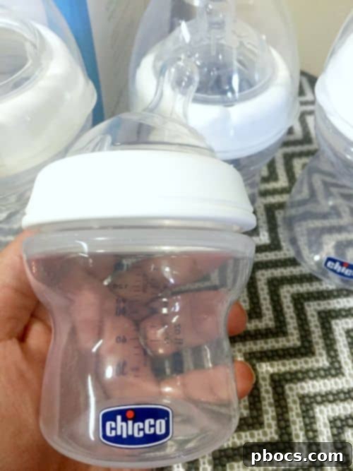 Happy Baby Feeding with Chicco NaturalFit Bottles