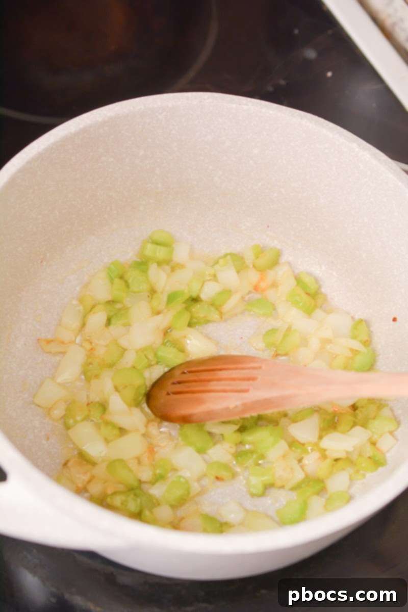 Hearty Keto Reuben Soup 8 Sautéing onions and celery in butter for Keto Reuben Soup.