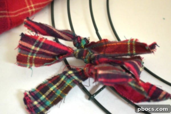 Tying Fabric Strips to Wire Wreath