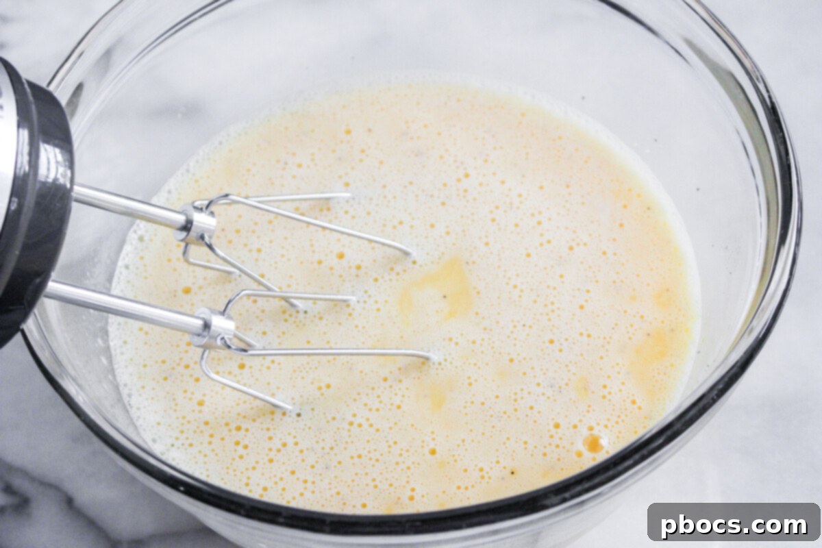 Savory Keto Breakfast Bake 9 Whisked Eggs Poured Over Casserole Ingredients