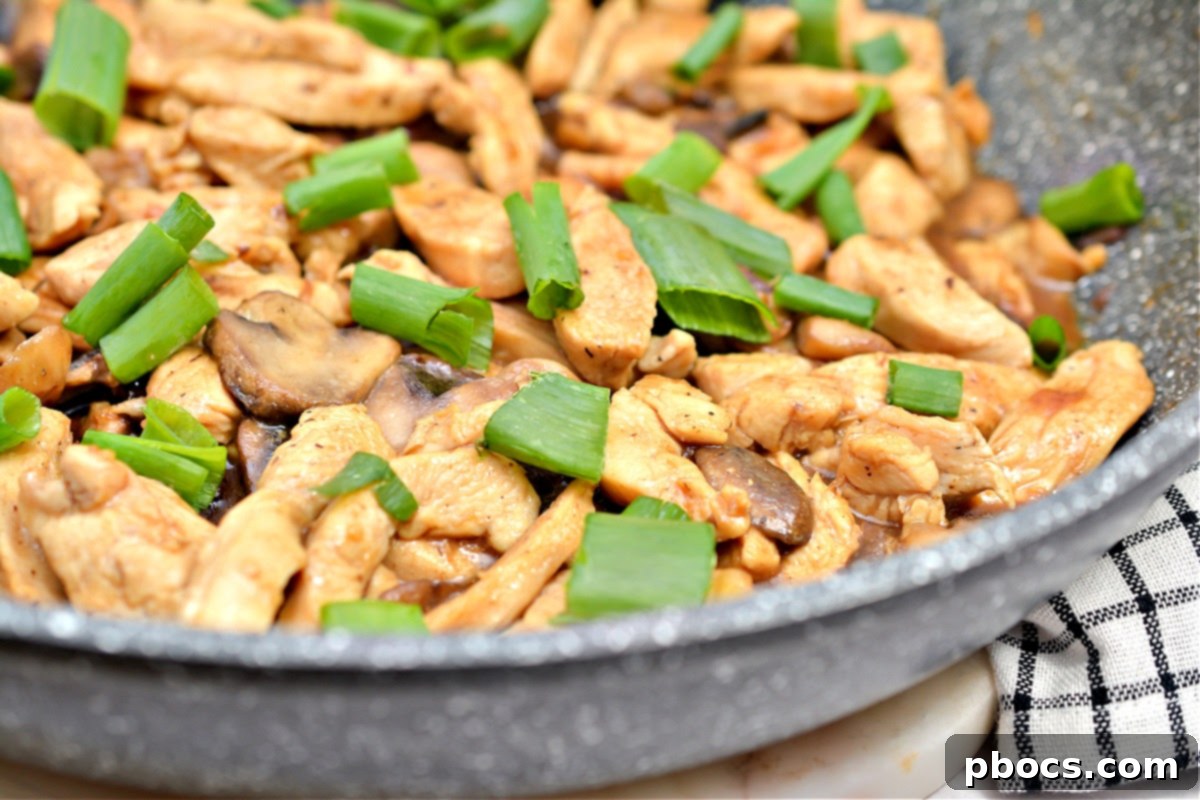 Keto Asian Mushroom Chicken Stir-fry 13 Finished Keto Asian Chicken with Mushrooms garnished with green onions