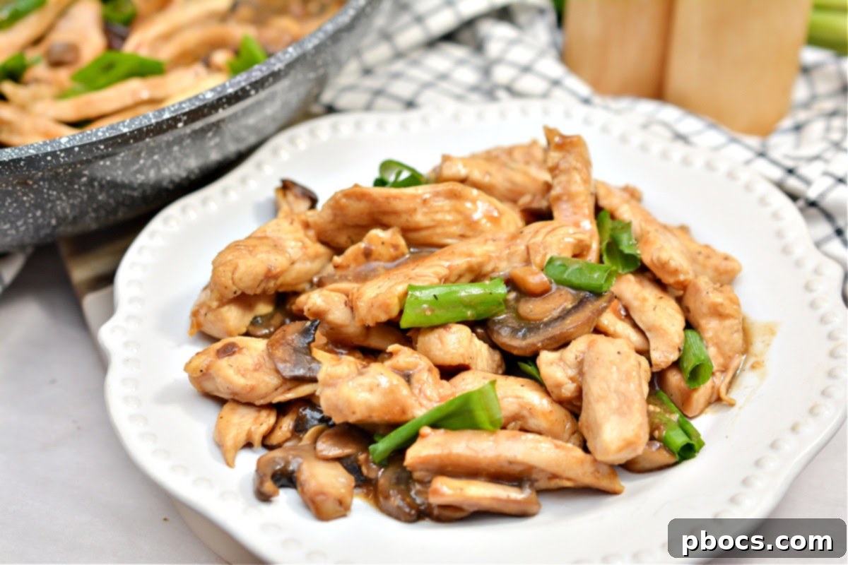 Keto Asian Mushroom Chicken Stir-fry 5 Keto Asian Chicken and Mushrooms cooking in a skillet