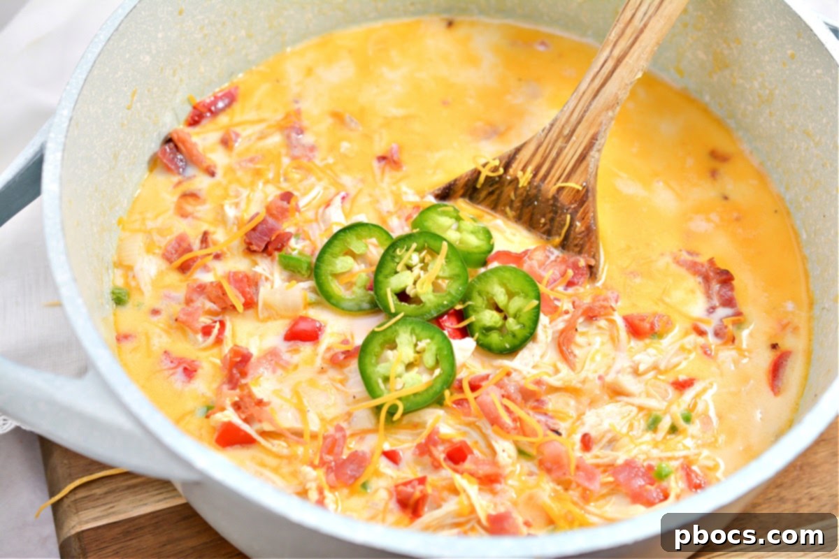 Creamy Keto Jalapeno Popper Soup 5 Keto Jalapeno Popper Soup in a glass storage container for meal prep