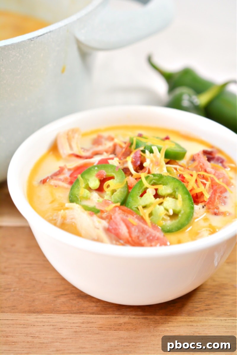 Creamy Keto Jalapeno Popper Soup 6 Keto Jalapeno Popper Soup served with keto garlic knots on the side