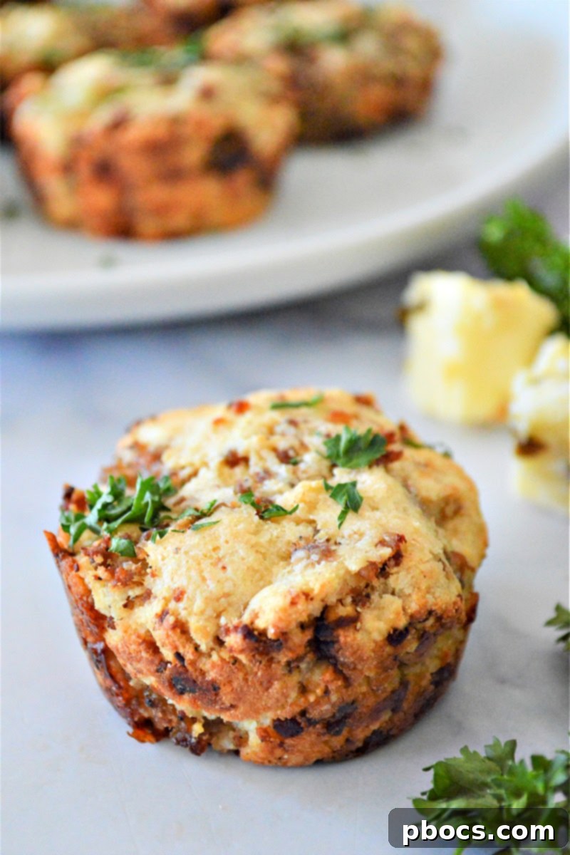Plated Keto Sausage Muffins with fresh parsley garnish