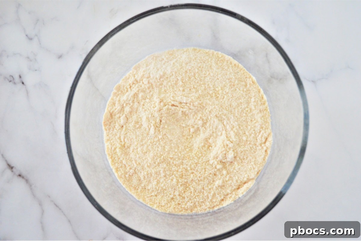 Mixing almond flour, coconut flour, and xanthan gum