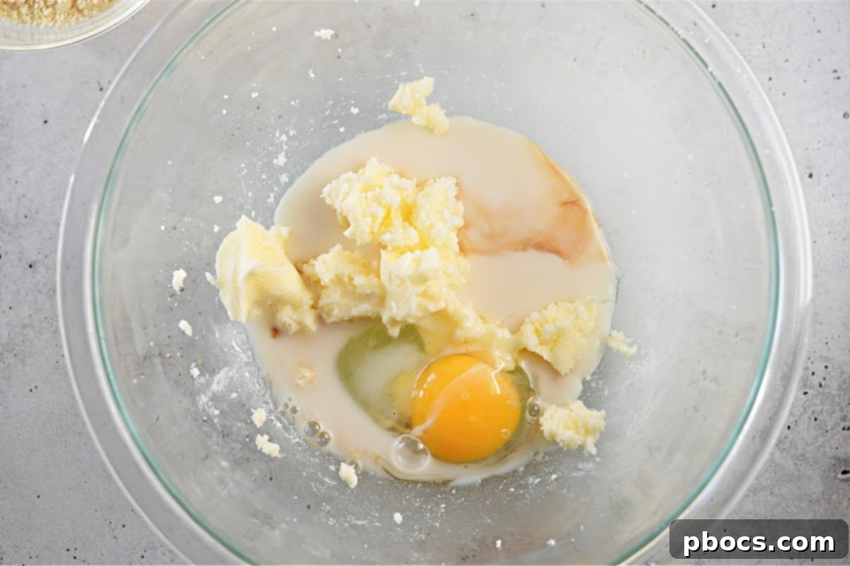 Mixing butter and sweetener for the keto pie crust.