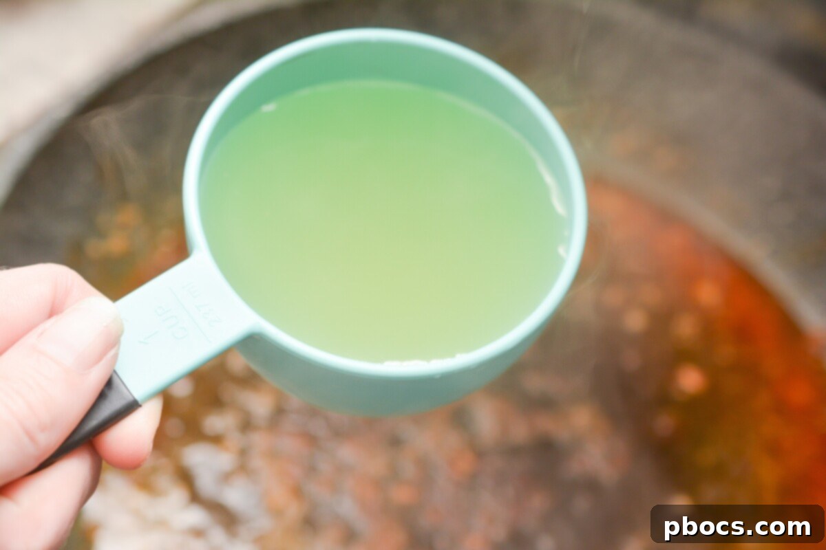 Step 5: Adding minced garlic to the skillet.