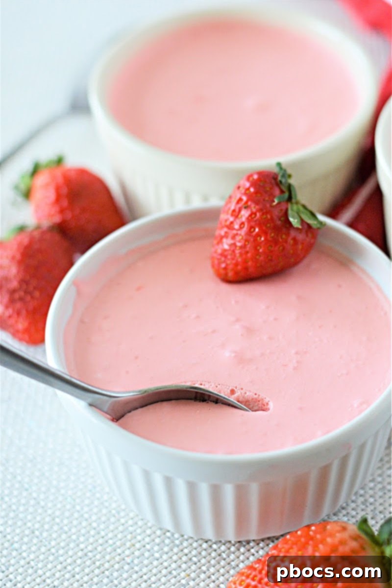 Airy Strawberry Keto Delight 4 Individual serving of Low Carb Strawberry Jello Fluff with mint garnish