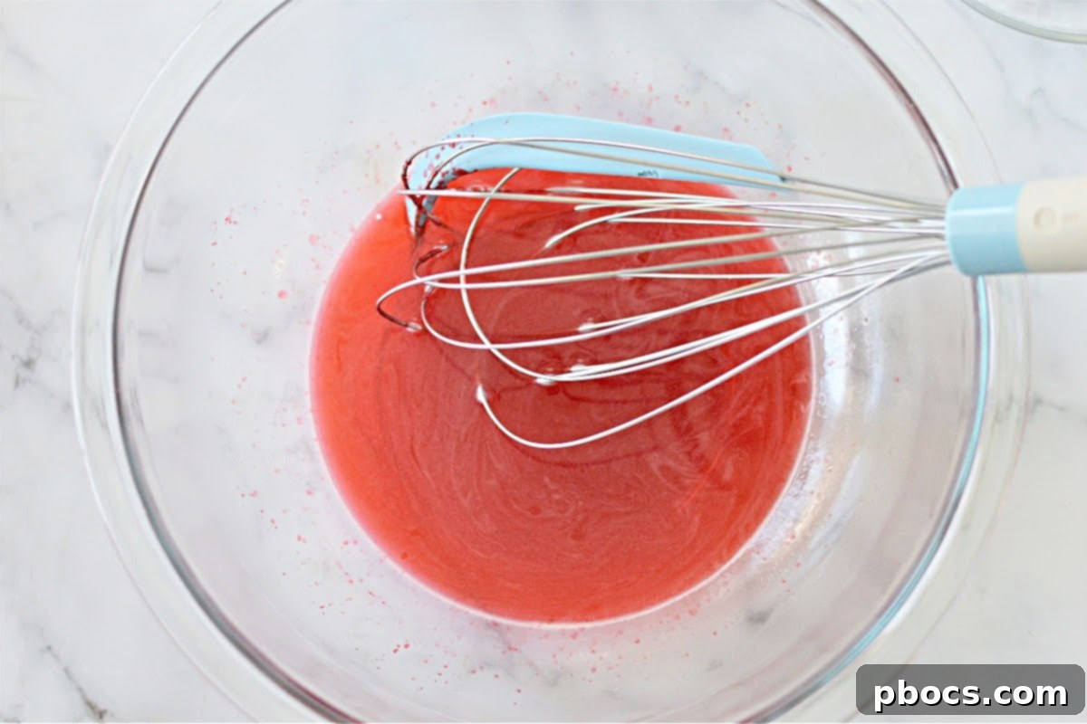 Airy Strawberry Keto Delight 8 Step 1: Dissolving sugar-free jello in boiling water