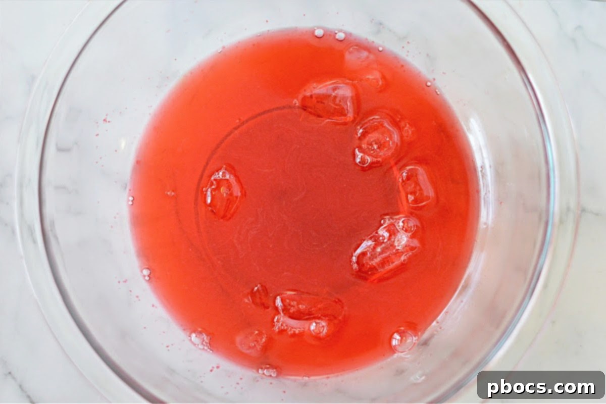 Airy Strawberry Keto Delight 9 Step 2: Preparing ice water for the jello mixture