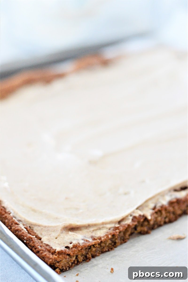 Finished and sliced Keto Gingerbread Cookie Bars with frosting