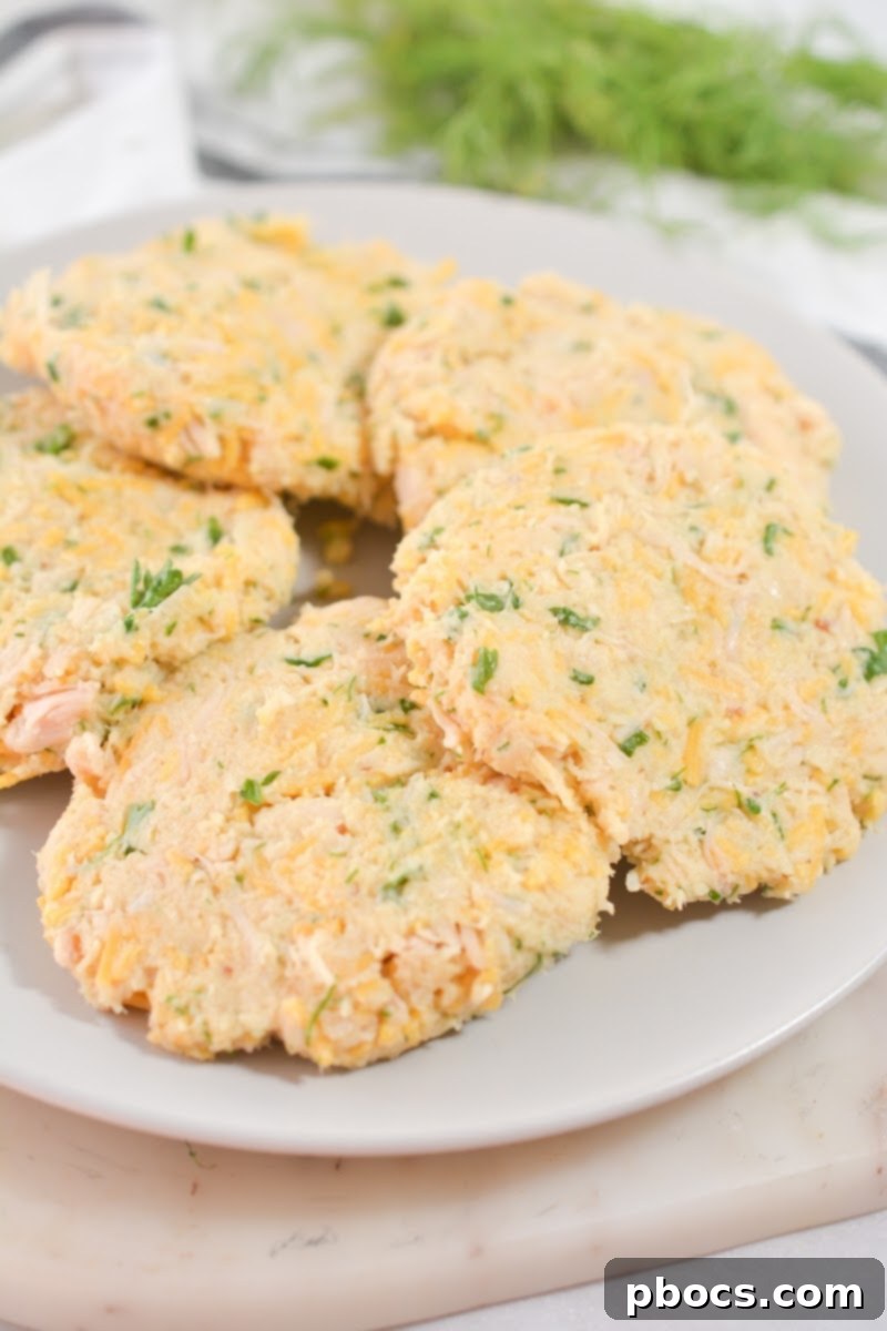 Forming uniform patties for Keto Cheesy Chicken Fritters