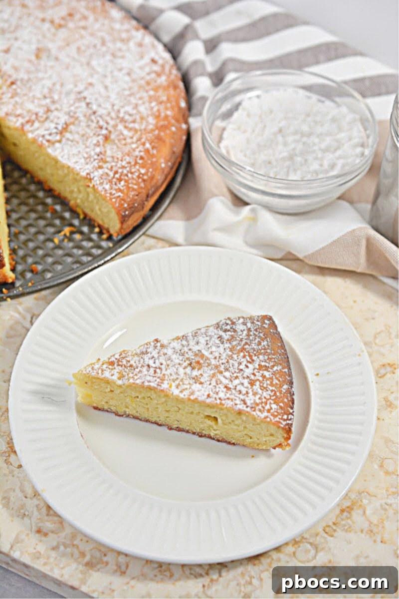 Keto Olive Oil Cake 2 Keto Olive Oil Cake - Close up of a slice on a plate