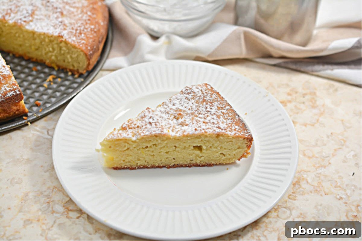 Keto Olive Oil Cake 3 Keto Olive Oil Cake - Whole cake dusted with powdered sweetener