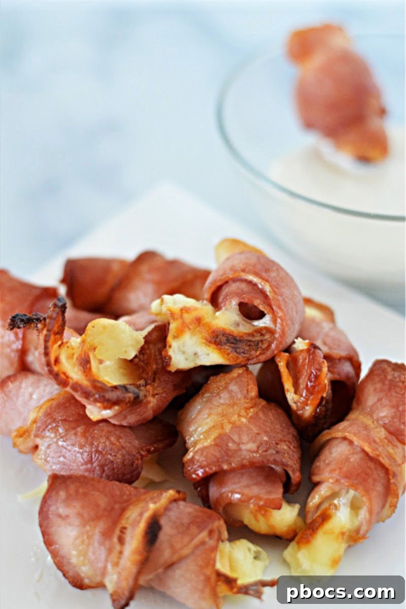 Bacon Wrapped Mozzarella Sticks - A holiday appetizer favorite