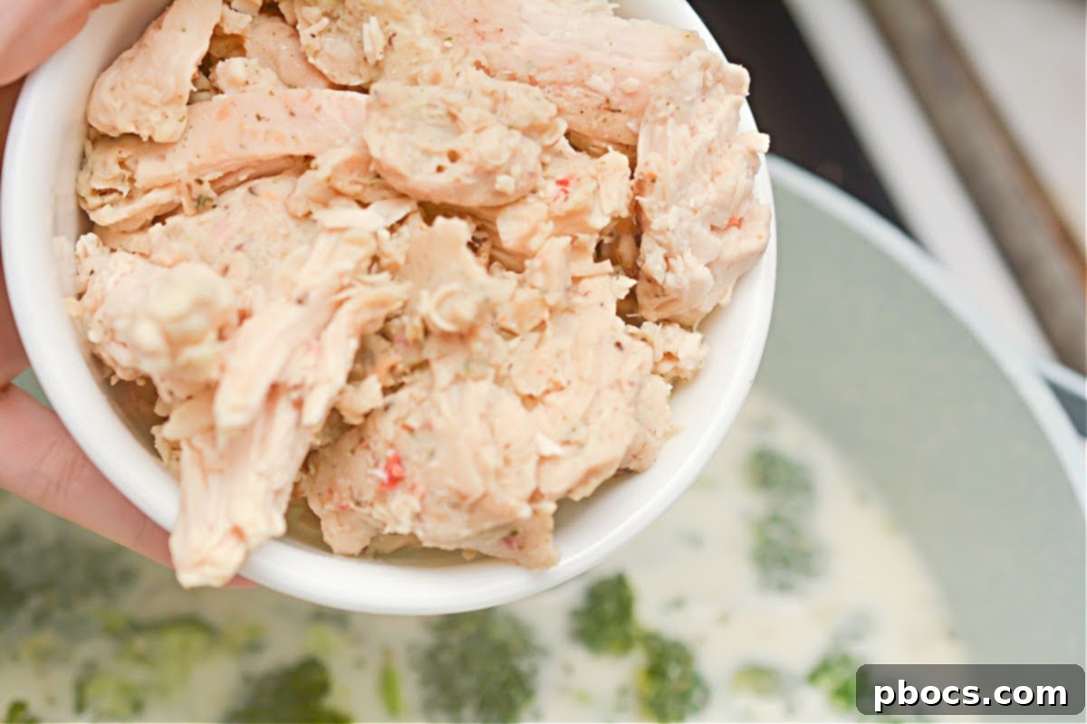 Creamy Keto Chicken Alfredo Soup 15 Simmering keto chicken alfredo soup until broccoli is tender