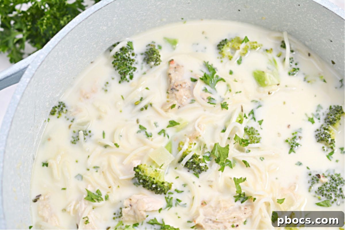 Creamy Keto Chicken Alfredo Soup 7 Multiple portions of Keto Chicken Alfredo Soup stored in meal prep containers