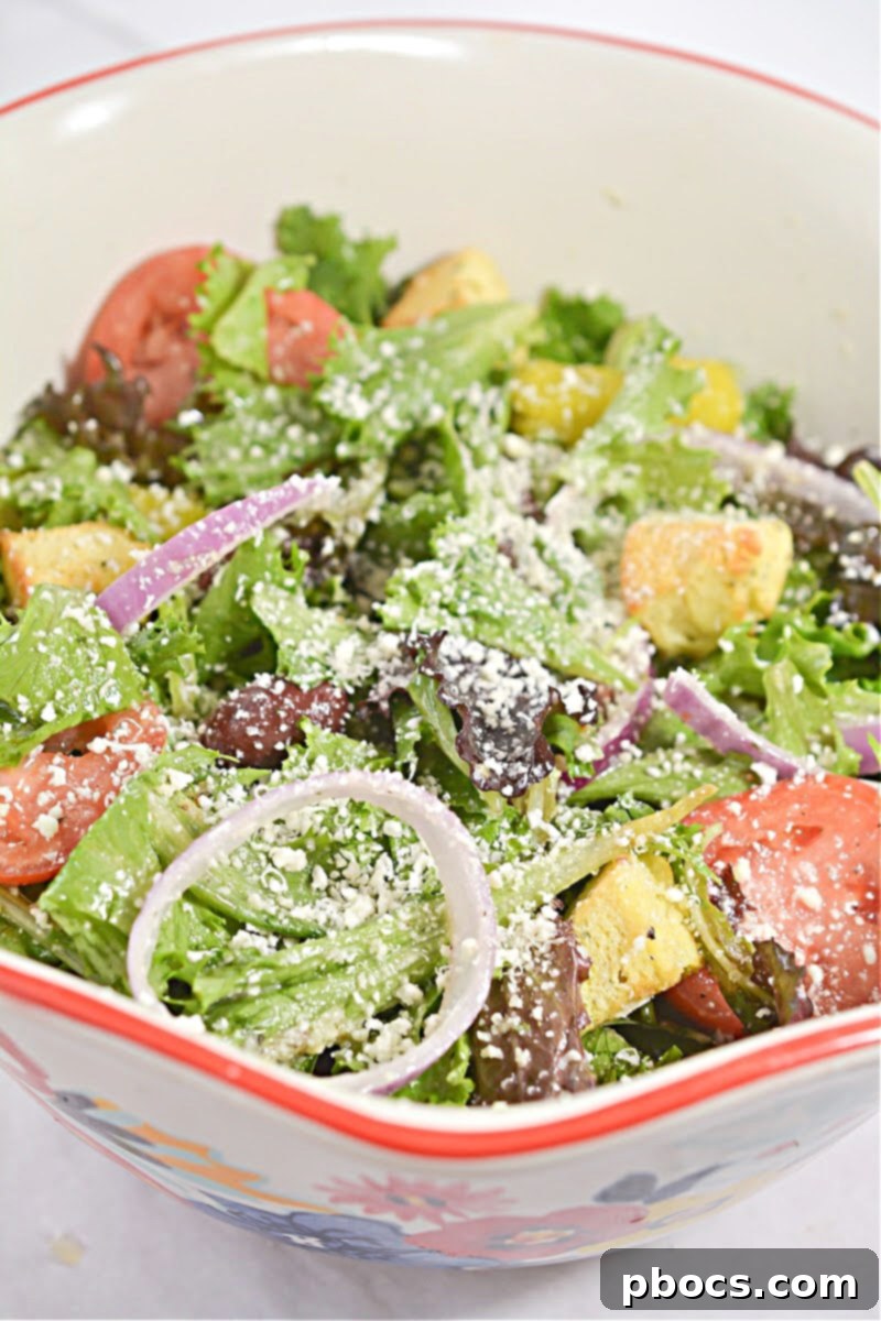 Keto Copycat Olive Garden Salad - a delicious low-carb alternative to the classic restaurant dish, featuring homemade keto croutons and a creamy, tangy dressing.