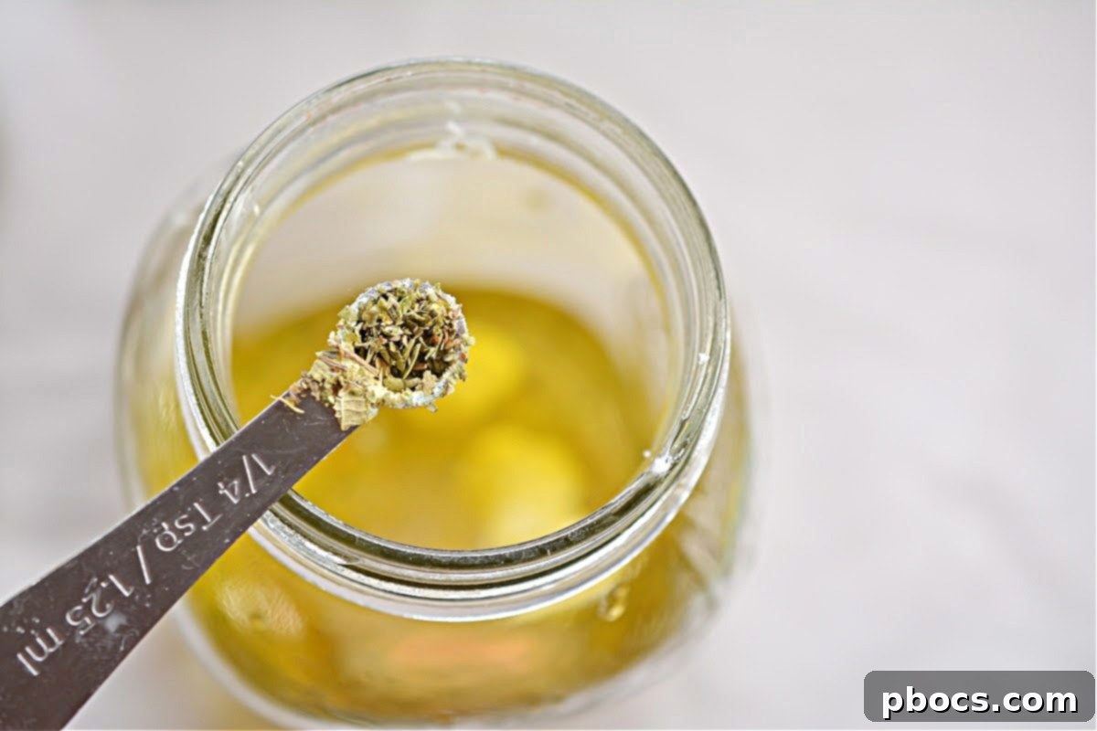 Crispy golden brown keto croutons on a baking sheet after broiling, ready to be added to the salad.