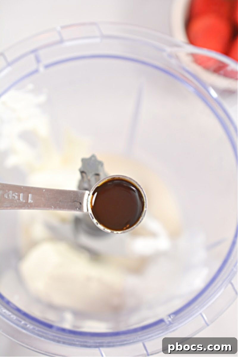 Blending Keto Strawberry Cheesecake Smoothie