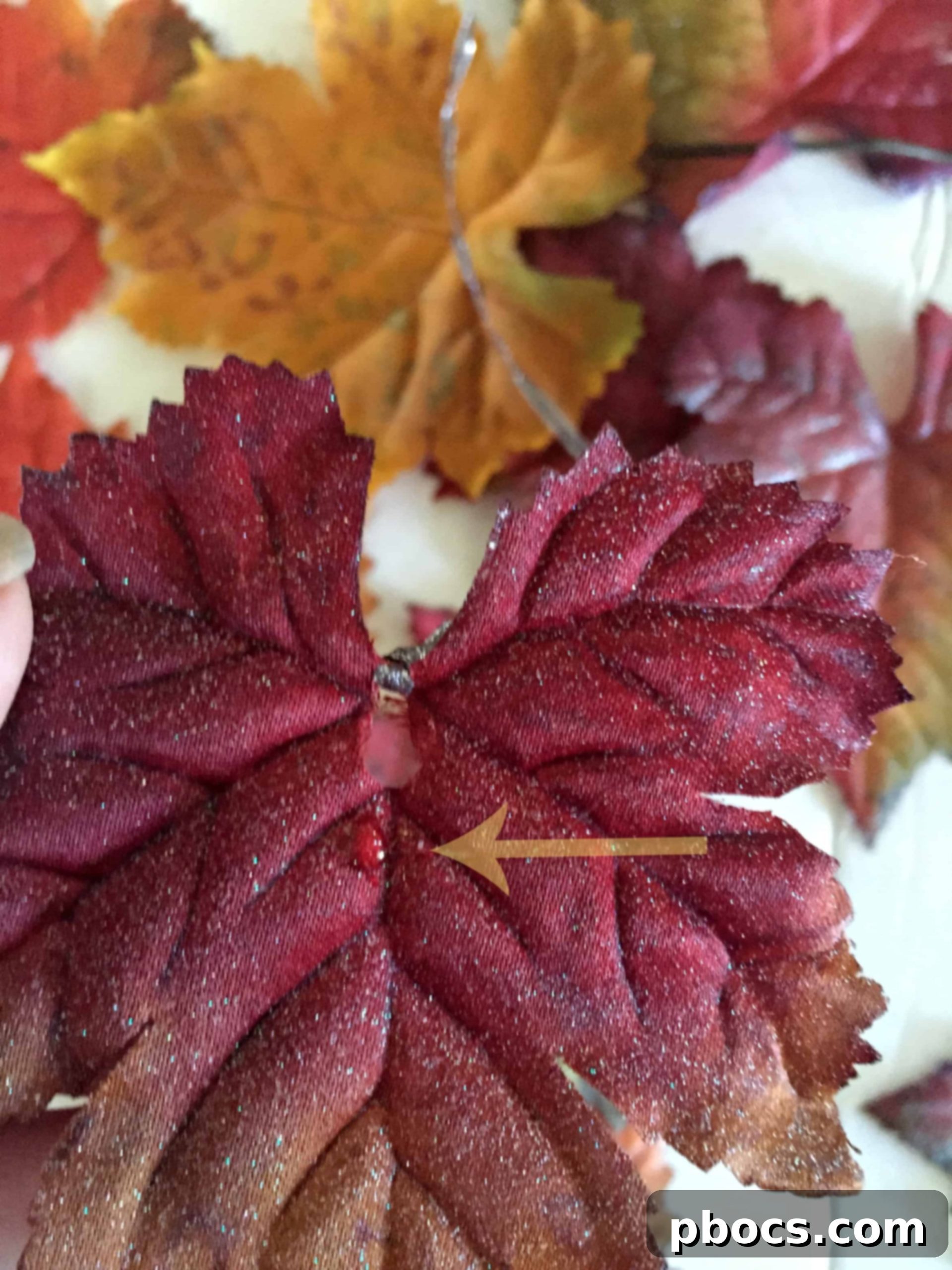 Layering craft leaves with glue for DIY garland