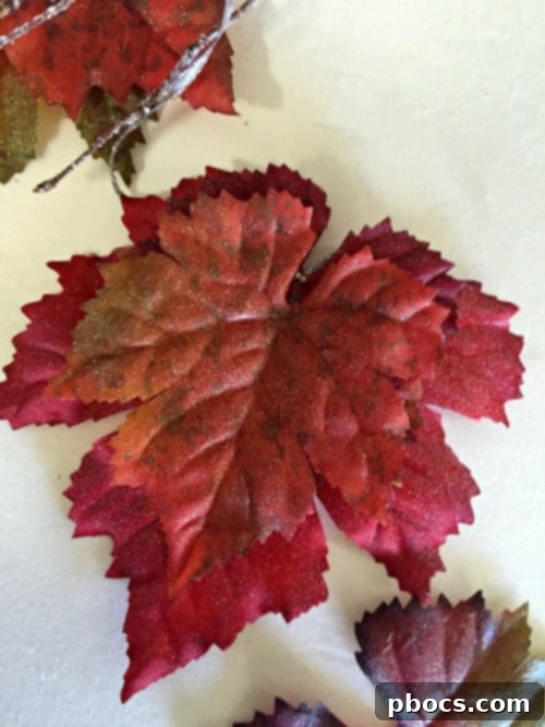 Finished DIY sparkly leaf garland displayed in a home