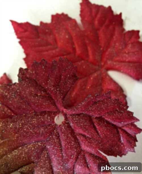 Close-up of punched hole in sparkly leaf