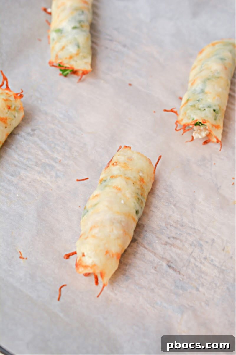 Filling the cheese wraps with chicken and spinach mixture