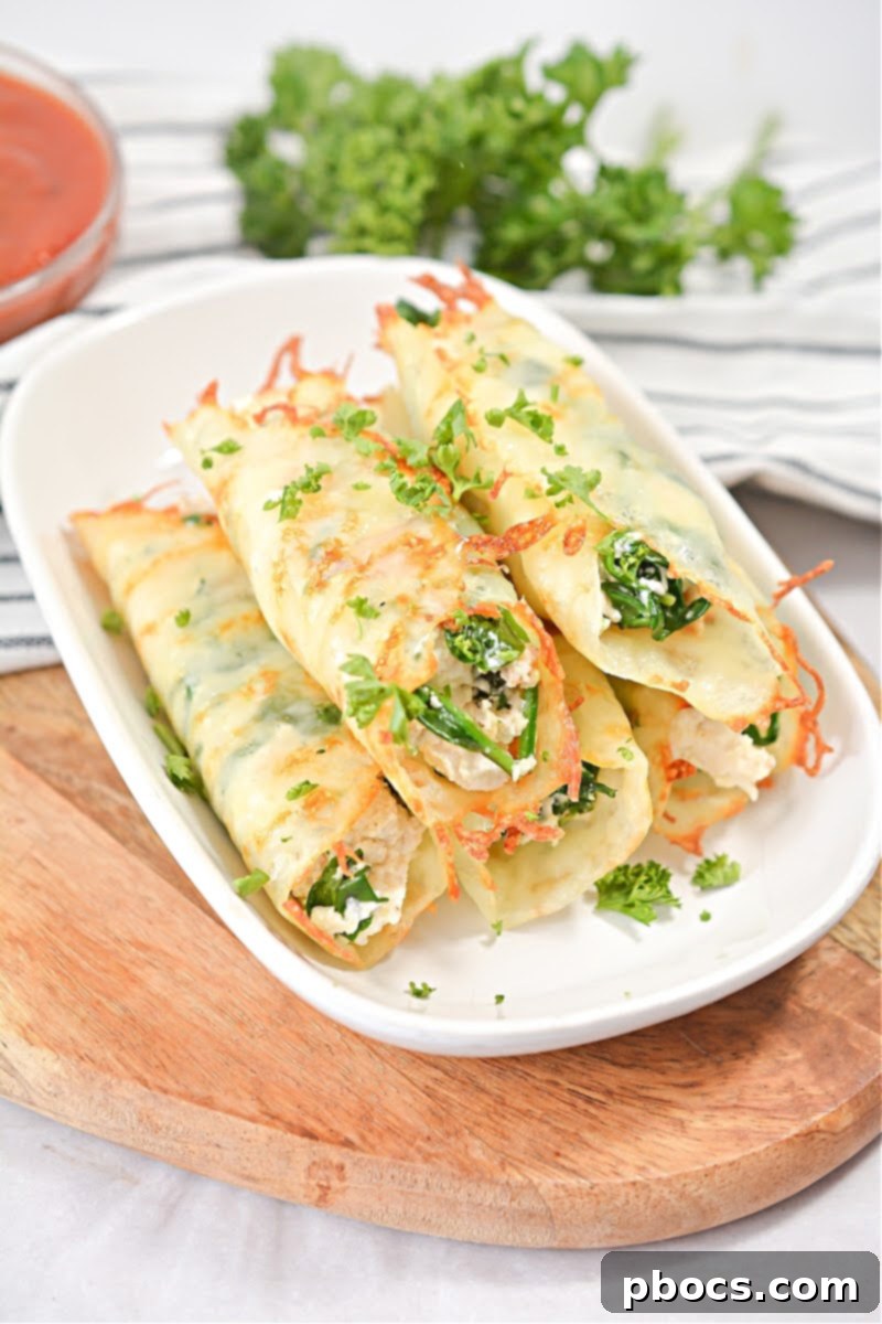 A freshly made Keto Lasagna Roll-Up being plated