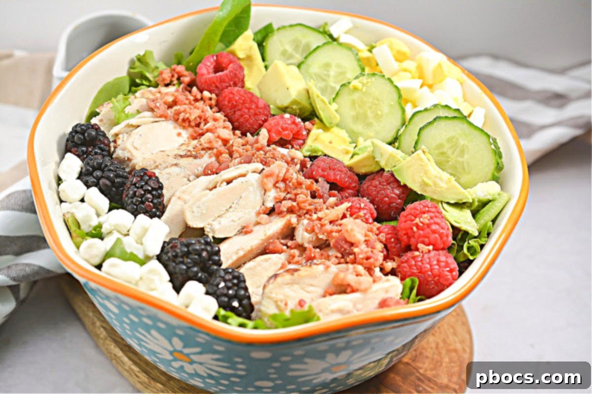 Berry Fresh Keto Cobb Salad 3 Close-up of fresh Cobb Salad ingredients including chicken, eggs, and berries