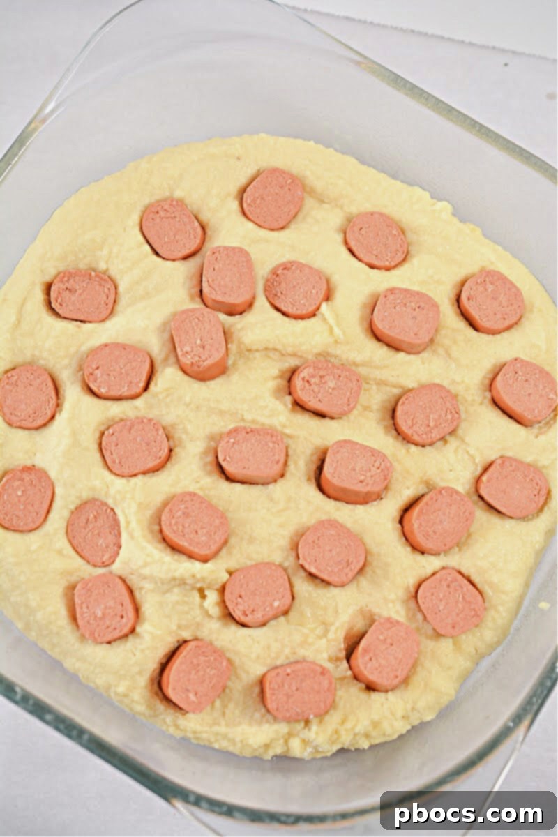 Mixing ingredients for Keto Hot Dog Casserole batter