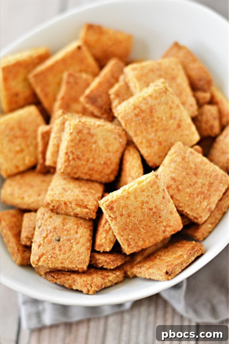 Close-up of freshly baked Keto Cheese Crackers on a baking sheet