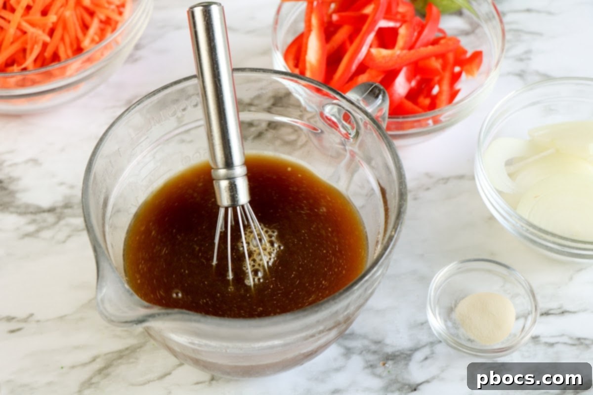 Wholesome Chicken Zoodle Stir-Fry 11 Cooking colorful vegetables for Low-Carb Chicken Zoodle Lo Mein