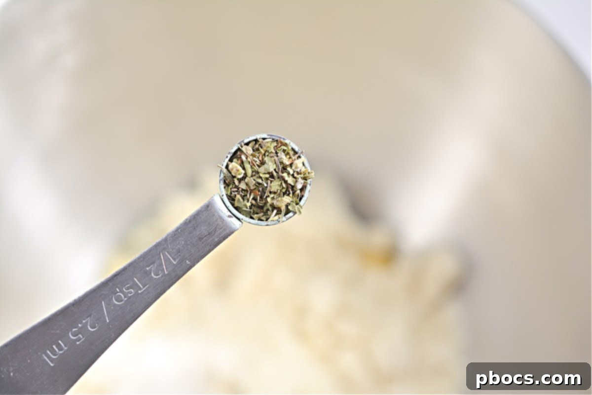 Mixing all crust ingredients to form a smooth fathead dough.