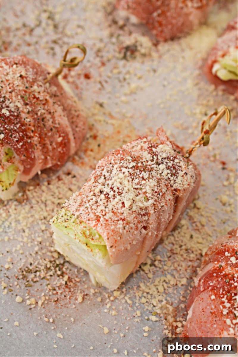 Savory Keto Bacon-Wrapped Cabbage 11 Step 4: Add Parmesan cheese and spices to Keto Bacon Wrapped Cabbage