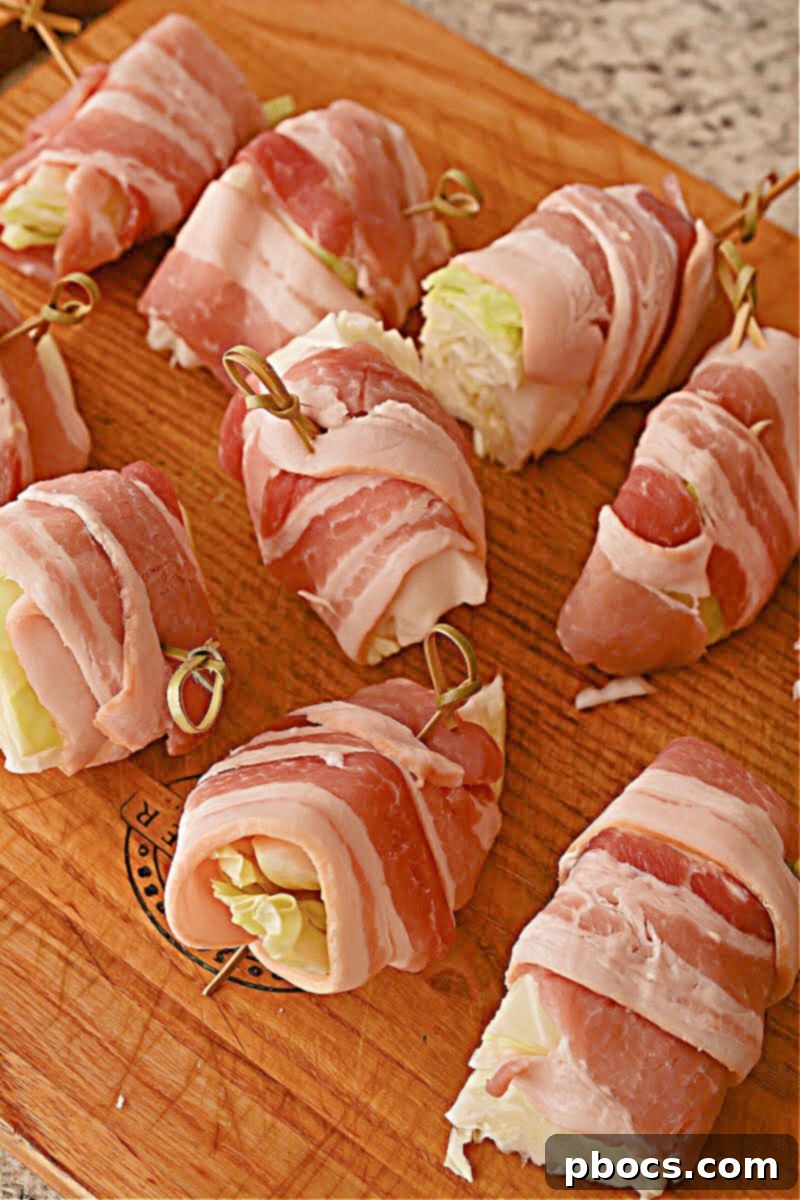 Savory Keto Bacon-Wrapped Cabbage 9 Step 2: Wrap each cabbage wedge with bacon for Keto Bacon Wrapped Cabbage