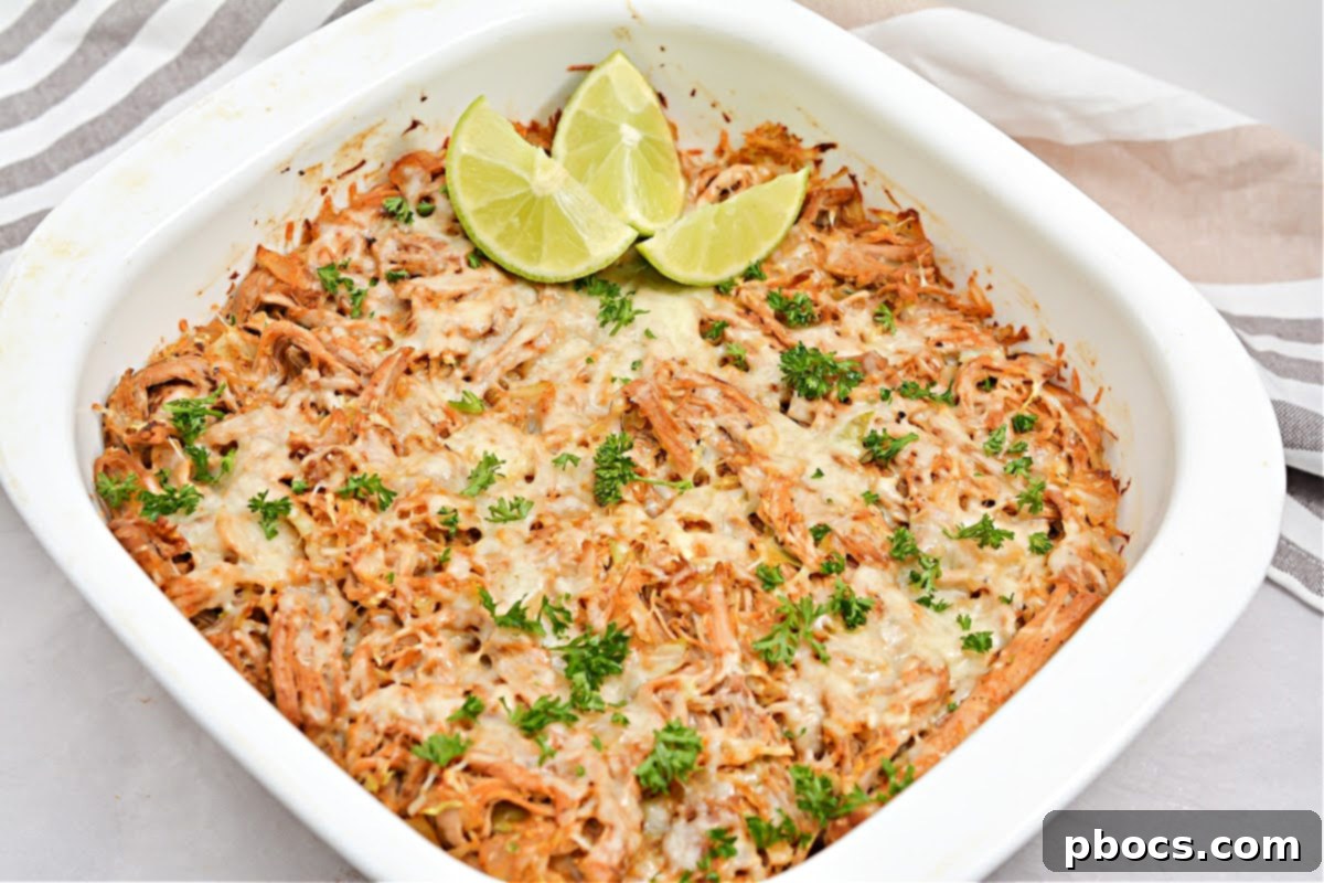 Keto Fiesta Pulled Pork Taco Casserole 15 Final plated Keto Mexican Pulled Pork Taco Casserole with fresh garnishes