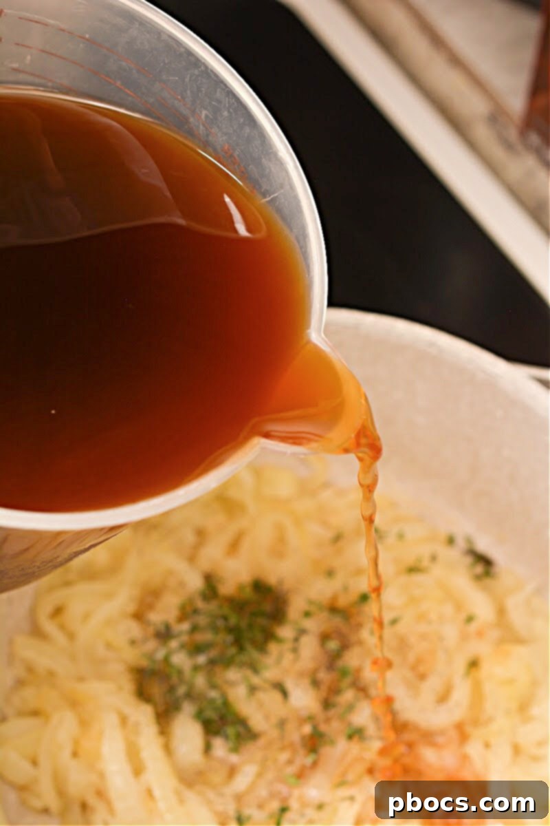 Deglazing the pot with white cooking wine