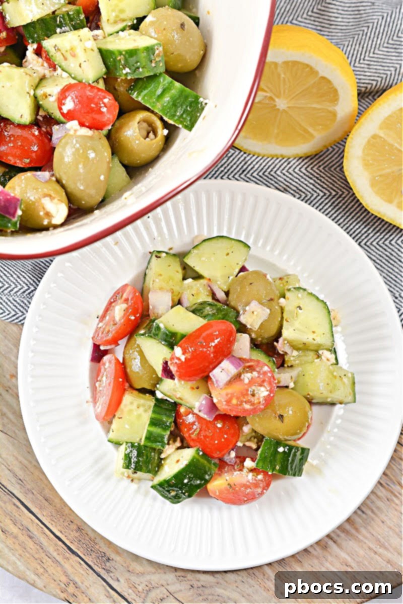 Close-up of fresh ingredients for Keto Greek Cucumber Salad before mixing