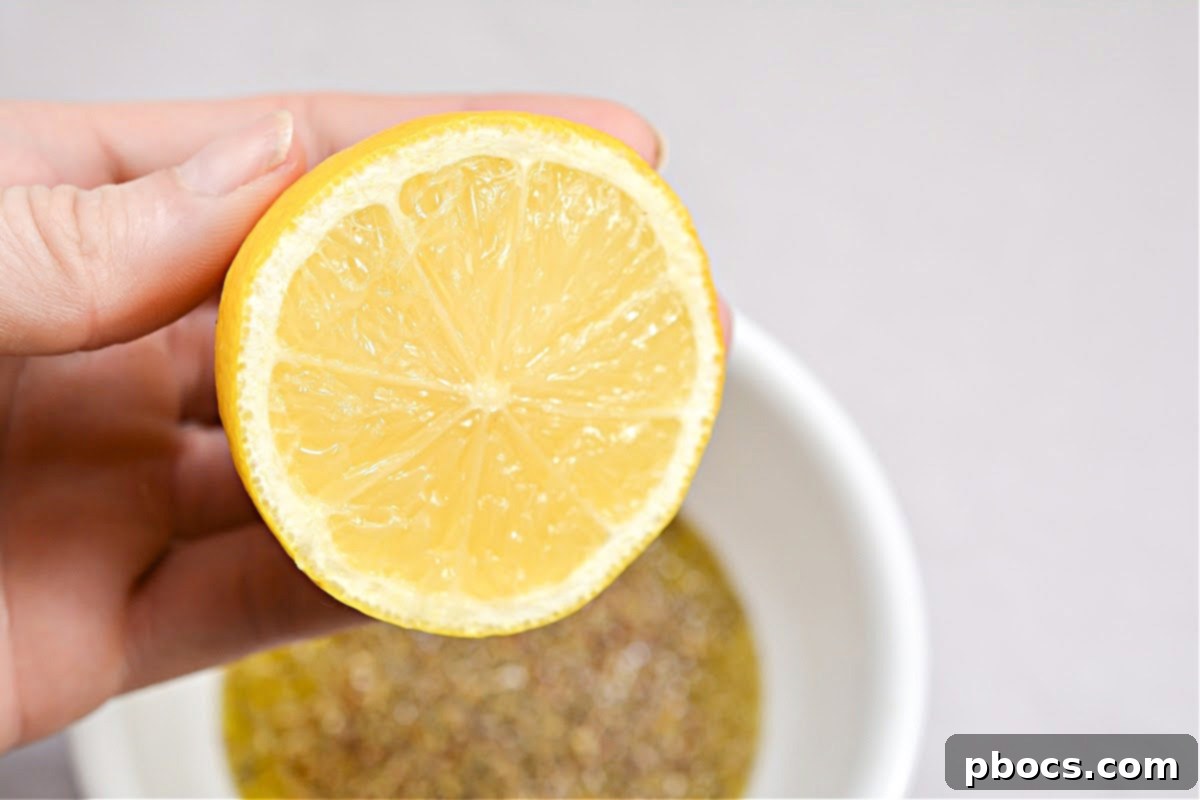 Whisking the homemade Greek salad dressing ingredients