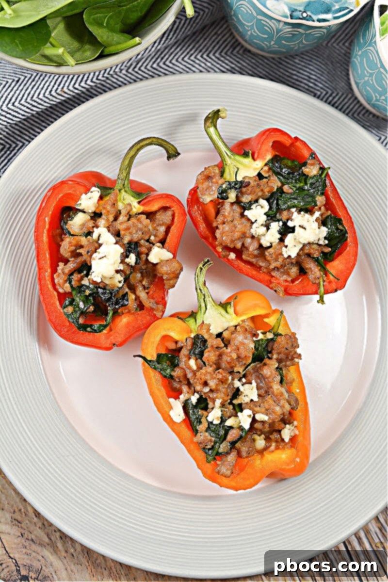 Hearty Keto Sausage Stuffed Bell Peppers 2 Keto Stuffed Peppers with Sausage - A perfect low-carb meal