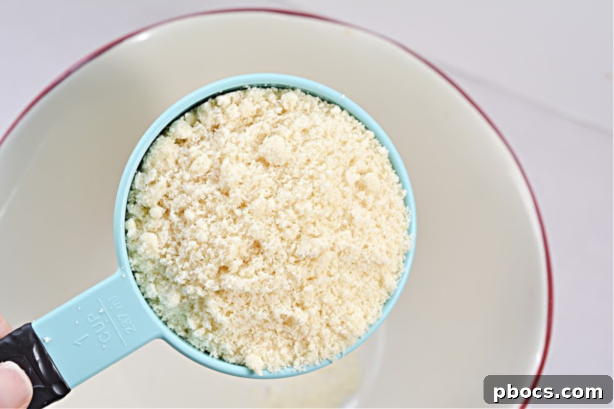 Mixing Keto Peanut Butter Cup Crust Ingredients