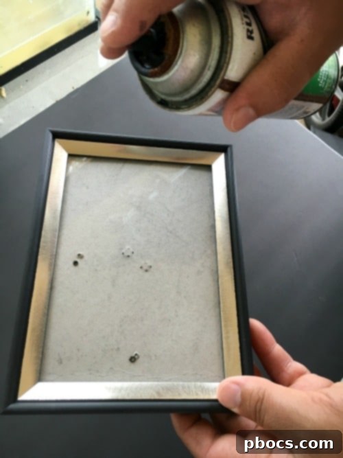 Custom Chalkboard Gum Storage Frame 5 Spraying a picture frame with chalkboard paint