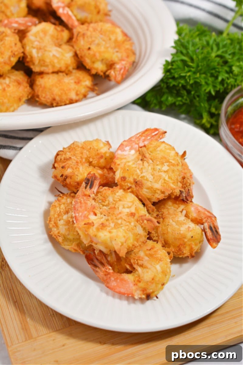 Air Fryer Keto Coconut Shrimp cooking to perfection
