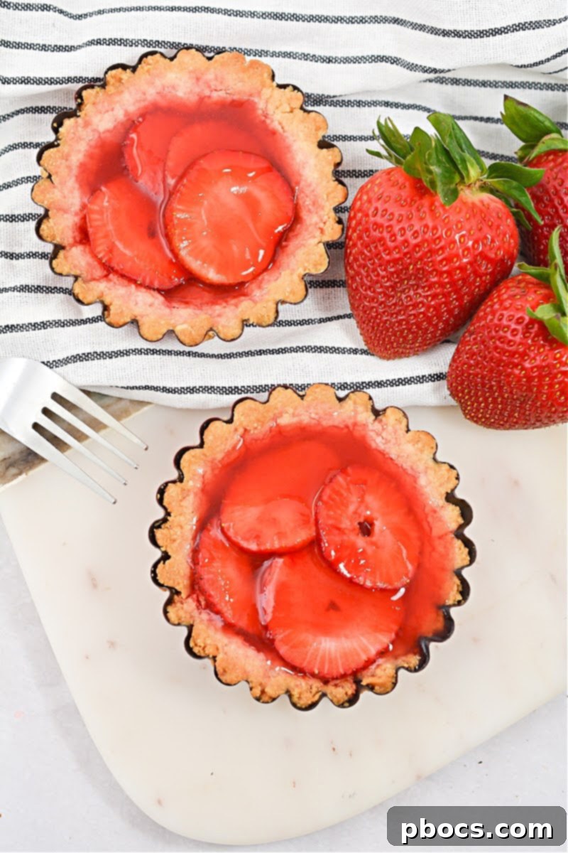 Delicious Keto Strawberry Mini Pies 2 Delicious Keto Strawberry Mini Pies arranged neatly for perfect portion control