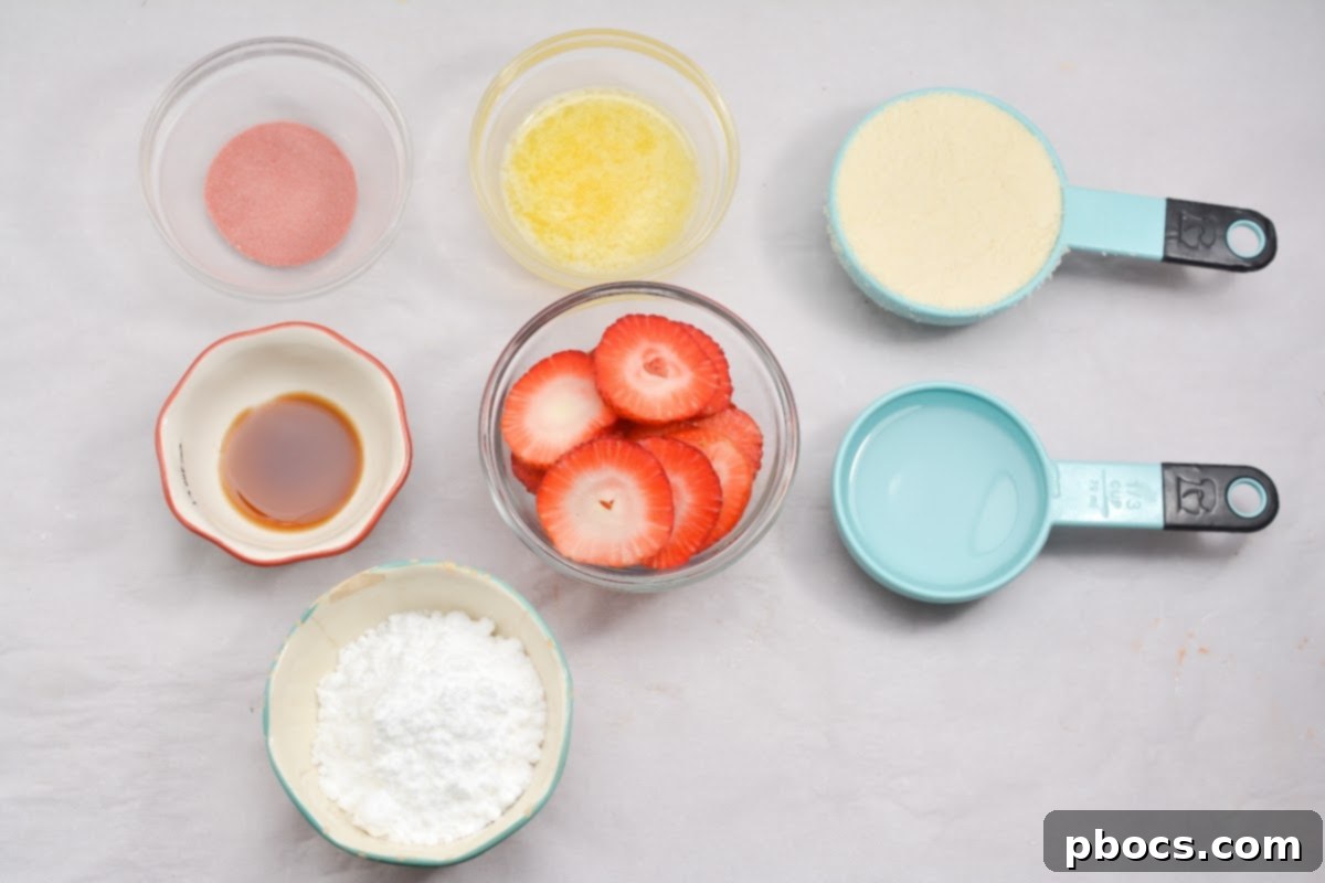 Delicious Keto Strawberry Mini Pies 6 Almond flour pie crust being pressed into mini pie tins