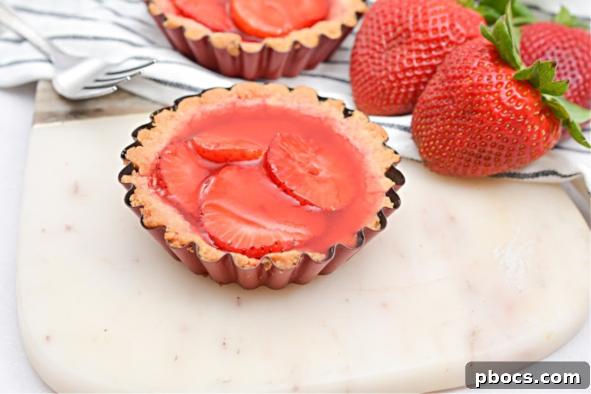 Delicious Keto Strawberry Mini Pies 7 Keto Strawberry Mini Pies stored in an airtight container in the refrigerator